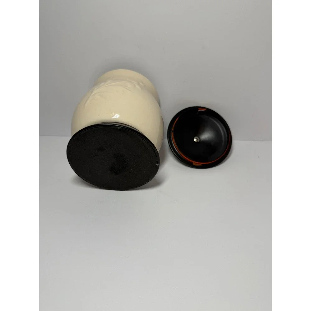 Cream Ceramic Jar with Embossed Floral Vine and Dark Brown Lid and Base